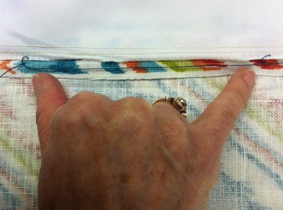 An interlock stitch in drapery panel